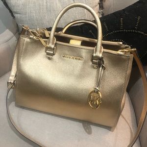 Gold Michael Kors purse